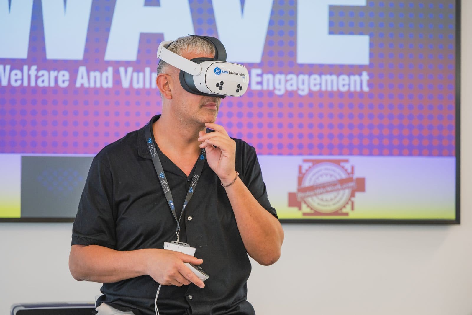 A trainer demonstrating VR in front of a WAVE presentation